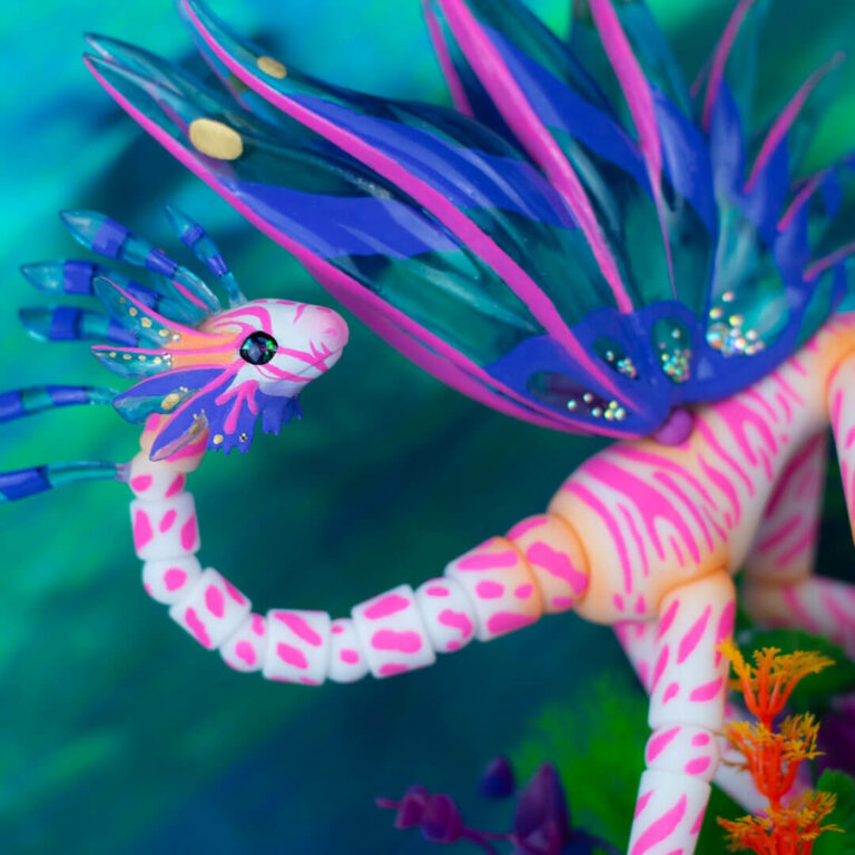 White dragon ball jointed doll decorated with pink stripes and big blue wings