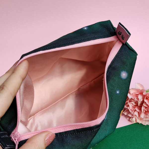 Green dragon themed pouch from the inside