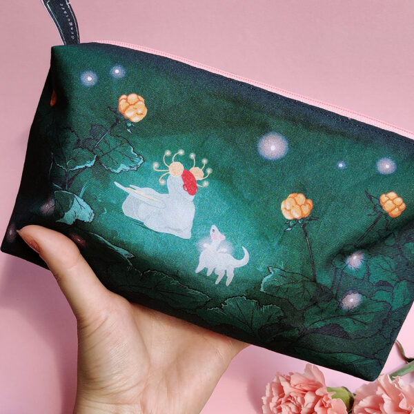 Dragon pouch held by hand