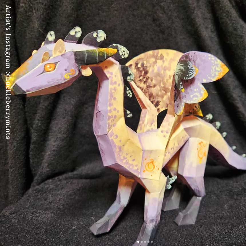 paper dragon decorated with purple and gold